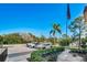 Well-maintained parking area with ample spaces and landscaping for convenient access and curb appeal at 1723 Gulf Rd # 104, Tarpon Springs, FL 34689