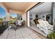 Cozy outdoor patio featuring comfortable seating and easy access to the living room at 1723 Gulf Rd # 104, Tarpon Springs, FL 34689