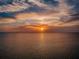 Beautiful sunset over the ocean, offering stunning views and a peaceful atmosphere at 1723 Gulf Rd # 104, Tarpon Springs, FL 34689