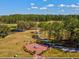 High angle view of the memorial garden framed by golf course and manicured grounds at 19504 Lily Pond Ct, Brooksville, FL 34601