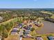Aerial view of the home's location with a pond nearby, showcasing community amenities and green spaces at 19504 Lily Pond Ct, Brooksville, FL 34601