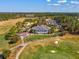The clubhouse features outdoor seating areas, perfect for enjoying social gatherings and golf course views at 19504 Lily Pond Ct, Brooksville, FL 34601