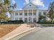 The Southern Hills Athletic and Aquatic Center with brick pathway and manicured landscaping at 19504 Lily Pond Ct, Brooksville, FL 34601