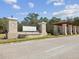 Brick entrance to Southern Hills community with elegant signage and manicured landscaping at 19504 Lily Pond Ct, Brooksville, FL 34601