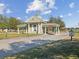 Community gate house entrance with a private property sign for residents only at 19504 Lily Pond Ct, Brooksville, FL 34601
