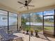 Relax on the screened patio and enjoy the lake views at 19504 Lily Pond Ct, Brooksville, FL 34601