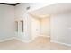 Bright living room with vaulted ceiling, light-colored walls, and neutral tile flooring at 2101 Sunset Point Rd # 2706, Clearwater, FL 33765