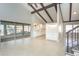 Open floorplan shows living and kitchen areas with vaulted ceilings, tiled floors and natural light at 2101 Sunset Point Rd # 2706, Clearwater, FL 33765