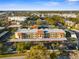 Aerial view of the complex showcasing amenities and ample parking at 2440 Winding Creek Blvd # 305, Clearwater, FL 33761