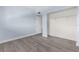 View of a bright bedroom offering lots of closet space and neutral walls and modern flooring at 2440 Winding Creek Blvd # 305, Clearwater, FL 33761