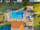 Birds-eye view of the community pool, spa, and surrounding lounge area at 2440 Winding Creek Blvd # 305, Clearwater, FL 33761
