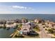 Waterfront homes showcase stunning coastal living with private docks and serene ocean views at 3073 Gulf Winds Cir, Hernando Beach, FL 34607