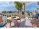 Balcony overlooking water furnished with table and chairs at 3073 Gulf Winds Cir, Hernando Beach, FL 34607