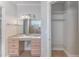 This bathroom features a spacious vanity and ample storage with direct access to a closet at 3073 Gulf Winds Cir, Hernando Beach, FL 34607