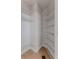 This walk-in closet features wire shelving, maximizing space and organization for easy storage at 3073 Gulf Winds Cir, Hernando Beach, FL 34607