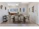 Dining room with modern table, chairs, and decorative rug for elegant meals at 3073 Gulf Winds Cir, Hernando Beach, FL 34607