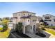 View of home showing attached garages, pool, and canal at 3073 Gulf Winds Cir, Hernando Beach, FL 34607