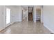 Spacious foyer with tile flooring, staircase, and ample natural light upon entry at 3073 Gulf Winds Cir, Hernando Beach, FL 34607