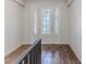 Bright and airy foyer with decorative wood-look floors and a stylish front door at 3073 Gulf Winds Cir, Hernando Beach, FL 34607