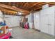 Spacious garage with white cabinets, garage door, and ample storage at 3542 Connon Dr, New Port Richey, FL 34652