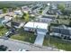 A lovely residential neighborhood featuring a home with a well-maintained lawn and paved driveway at 3640 Richboro Dr, Holiday, FL 34691