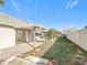 Home features a covered patio and a partially fenced backyard at 3640 Richboro Dr, Holiday, FL 34691