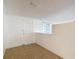 Bright entryway featuring tile floors and a charming arched window at 3640 Richboro Dr, Holiday, FL 34691