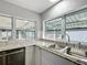 Close-up of modern kitchen area featuring granite countertops and a stainless steel sink at 3640 Richboro Dr, Holiday, FL 34691