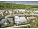An aerial view shows the home's position relative to neighborhood streets and nearby waterfront at 3640 Richboro Dr, Holiday, FL 34691