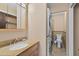 Bathroom including a vanity area, toilet and washer-dryer for extra convenience at 432 Moorings Cove Dr. # 432, Tarpon Springs, FL 34689