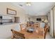 Inviting dining area connects seamlessly with the living room and kitchen at 432 Moorings Cove Dr. # 432, Tarpon Springs, FL 34689