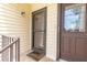 Close-up of front entrance featuring a secure door and welcoming details at 432 Moorings Cove Dr. # 432, Tarpon Springs, FL 34689