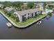 Waterfront condos, including one with a dock and boat, plus a community pool at 432 Moorings Cove Dr. # 432, Tarpon Springs, FL 34689