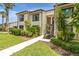 Attractive two-story condo with well-maintained landscaping and a private entrance at 432 Moorings Cove Dr. # 432, Tarpon Springs, FL 34689