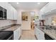 Well-maintained kitchen with modern appliances and neutral tones offers a welcoming space at 432 Moorings Cove Dr. # 432, Tarpon Springs, FL 34689