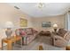 Comfortable living room offers a relaxed atmosphere for gatherings and leisure at 432 Moorings Cove Dr. # 432, Tarpon Springs, FL 34689