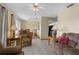 Open-concept living room with great connectivity to dining area and kitchen at 432 Moorings Cove Dr. # 432, Tarpon Springs, FL 34689