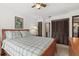 Serene main bedroom retreat with closet space and warm natural light at 432 Moorings Cove Dr. # 432, Tarpon Springs, FL 34689