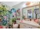 Bathroom decorated with flamingo and tropical theme at 6002 Laketree Ln # L, Temple Terrace, FL 33617
