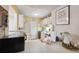 Charming kitchen featuring white cabinetry, and an abundance of counter space at 6002 Laketree Ln # L, Temple Terrace, FL 33617