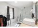 Modern bathroom with tiled shower and floor, plus modern vanity at 6305 S Macdill Ave, Tampa, FL 33611