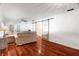 Cozy living room featuring hardwood floors, contemporary sliding doors, and neutral decor at 6305 S Macdill Ave, Tampa, FL 33611