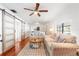 Inviting living room with hardwood floors, stylish sliding doors, and comfortable seating at 6305 S Macdill Ave, Tampa, FL 33611