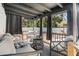 Relaxing covered patio featuring a table and chairs at 6305 S Macdill Ave, Tampa, FL 33611