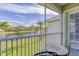 Balcony seating with relaxing view at 6734 Dali Ave # 205, Land O Lakes, FL 34637