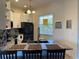 Stylish kitchen featuring granite countertops, stainless steel appliances, and a backsplash at 6734 Dali Ave # 205, Land O Lakes, FL 34637