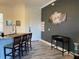 Modern kitchen with an island and bar seating, perfect for entertaining guests at 6734 Dali Ave # 205, Land O Lakes, FL 34637