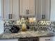 Close-up of a kitchen with under-cabinet wine rack at 6734 Dali Ave # 205, Land O Lakes, FL 34637