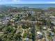 This aerial view shows the property and its location along the canal, providing direct access to the bay and Gulf at 7235 Maryland Ave, Hudson, FL 34667