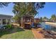 Backyard features a wooden deck overlooking the water, offering a relaxing outdoor space at 7235 Maryland Ave, Hudson, FL 34667